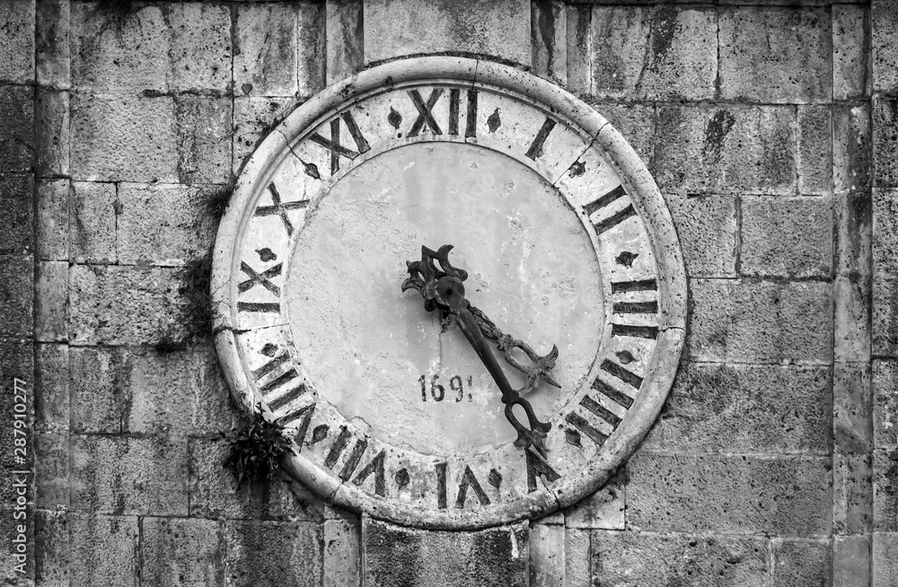 Ancient clock tower on Bell Tower in Perast Ancient clock tower on Bell Tower in Perast