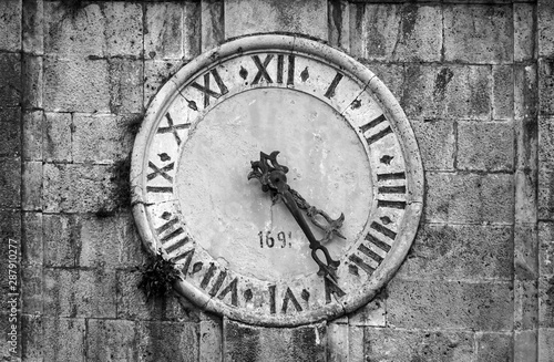 Ancient clock tower on Bell Tower in Perast