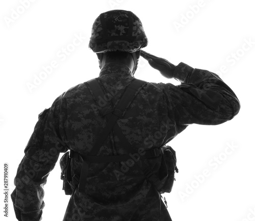 Silhouette of saluting soldier on white background, back view