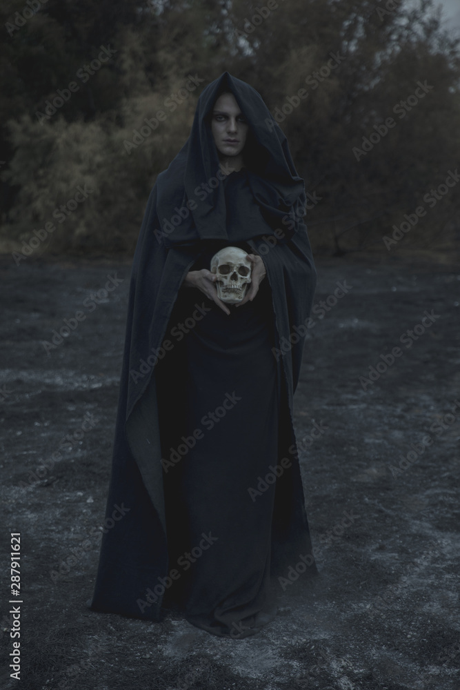 Portrait of a male mage in black clothes Portrait of a male mage in black clothes