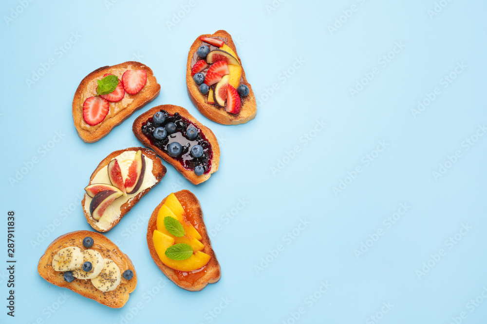 Different tasty sandwiches on color background Different tasty sandwiches on color background