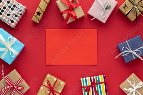 Christmas composition. Gifts boxa and envelope  top view background with copy space for your text. Flat lay. photo