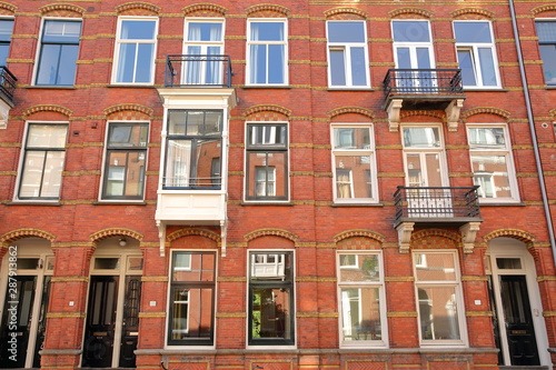 Colorful heritage buildings, located on Van Eeghenstraat street next to Vondelpark, Amsterdam, Netherlands