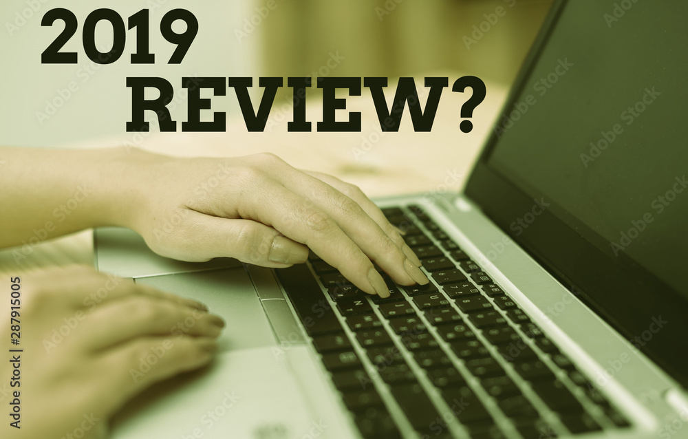 Text sign showing 2019 Review Question. Business photo text remembering past year events main actions or good shows woman laptop computer smartphone mug office supplies technological devices Text sign showing 2019 Review Question. Business photo text remembering past year events main actions or good shows woman laptop computer smartphone mug office supplies technological devices