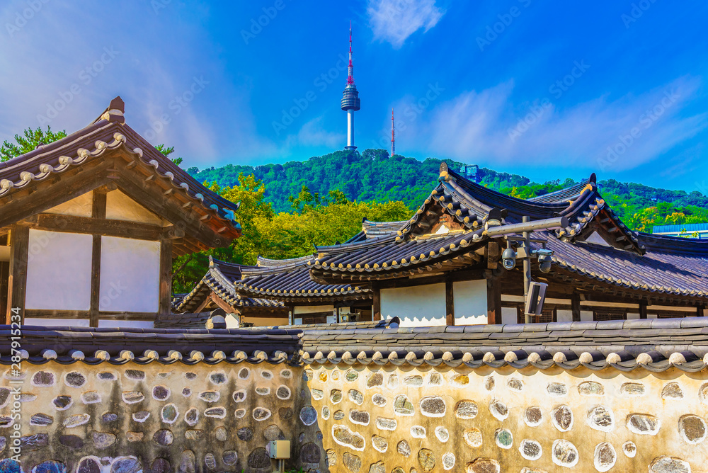 Naklejka premium Morning atmosphere of Namsangol traditional village and seoul tower,south korea.