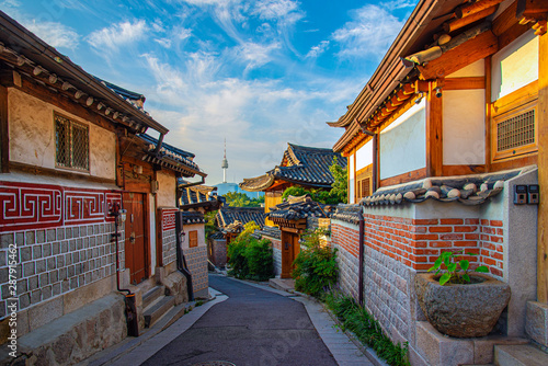 Canvas Print Morning atmosphere of Bukchon hanok village and seoul tower background,south korea