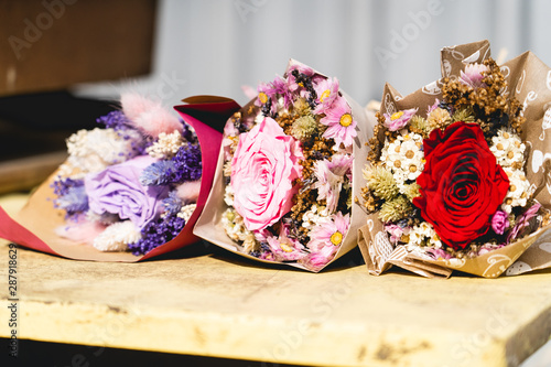 dried flowers bouquet of roses under the sun