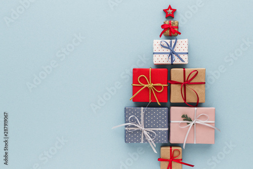 Christmas composition.Gift box and star top view background with copy space for your text. Flat lay.