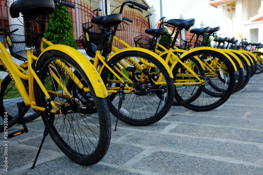 BANGKOK, THAILAND - JULY 23, 2019: Co Van Kessel Bike Tour in Front of Wat Kalayanamit Temple. Bike Trips is a famous activity in Bangkok, Thailand.