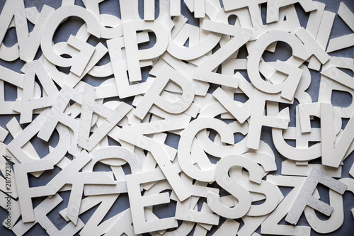 Mixed letters pile top view photo