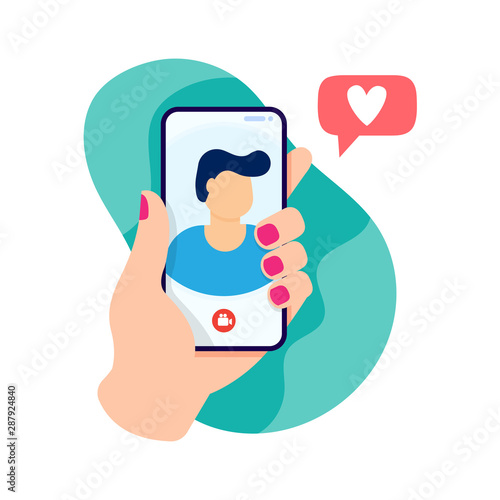 Female hand holding smartphone with boyfriend on screen.
