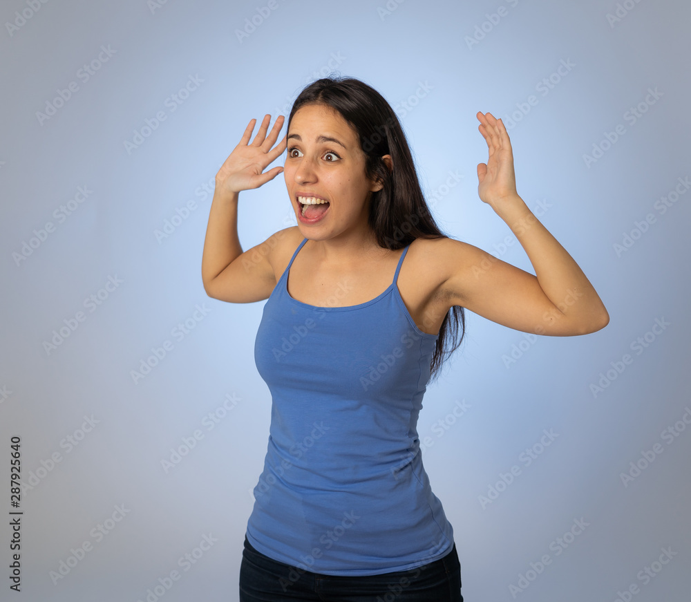 Fototapeta premium Close up portrait of surprised and happy woman feeling lucky