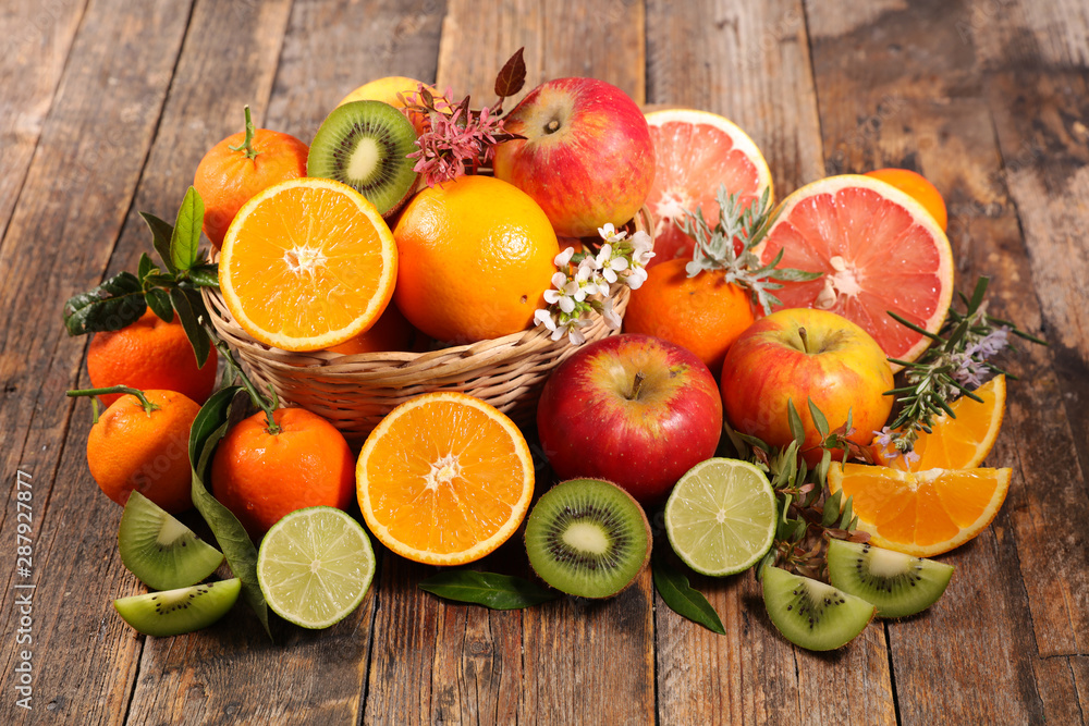 assorted of fruits, orange with apple, kiwi and clementine - obrazy, fototapety, plakaty 