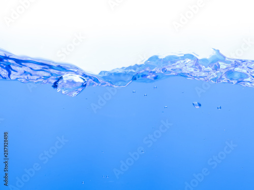 Clean blue water and waves against a white background