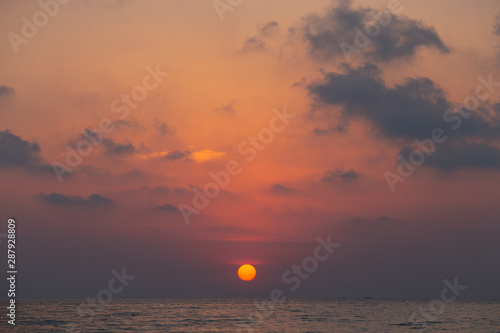 sunset over the sea © Keerati