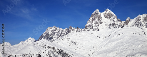 Mount Ushba in winter at sunny day