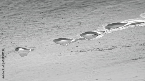 Drops of water fall from the plastered ceiling. Leak between floors of a house in need of repair.