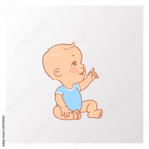 Cute little baby boy in diaper sitting, pointing with finger.