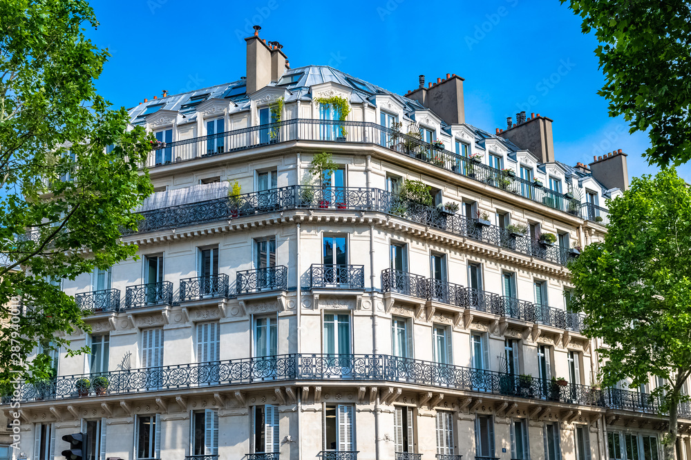 Paris, typical building, parisian facade wall and windows boulevard de Sebastopol