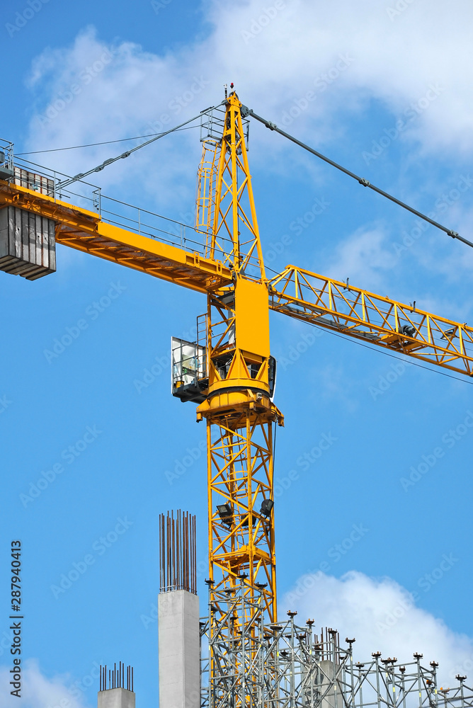 Crane and highrise construction site Crane and highrise construction site