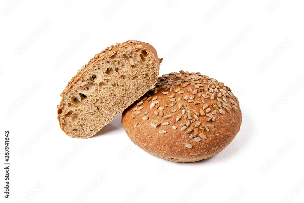 Whole wheat bread isolated on white background. One and a half sliced