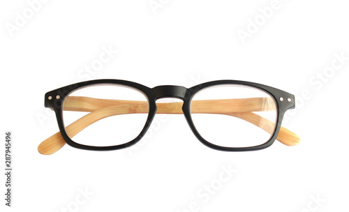 isolated​ eyeglasses on​ white​ background​ and​ glasses legs is​ wooden​ pattern.