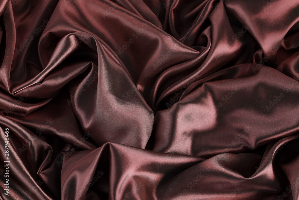 Fototapeta premium silk fabric texture, background brown, dark red color . copy space