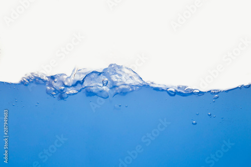 close up of water waves on white background