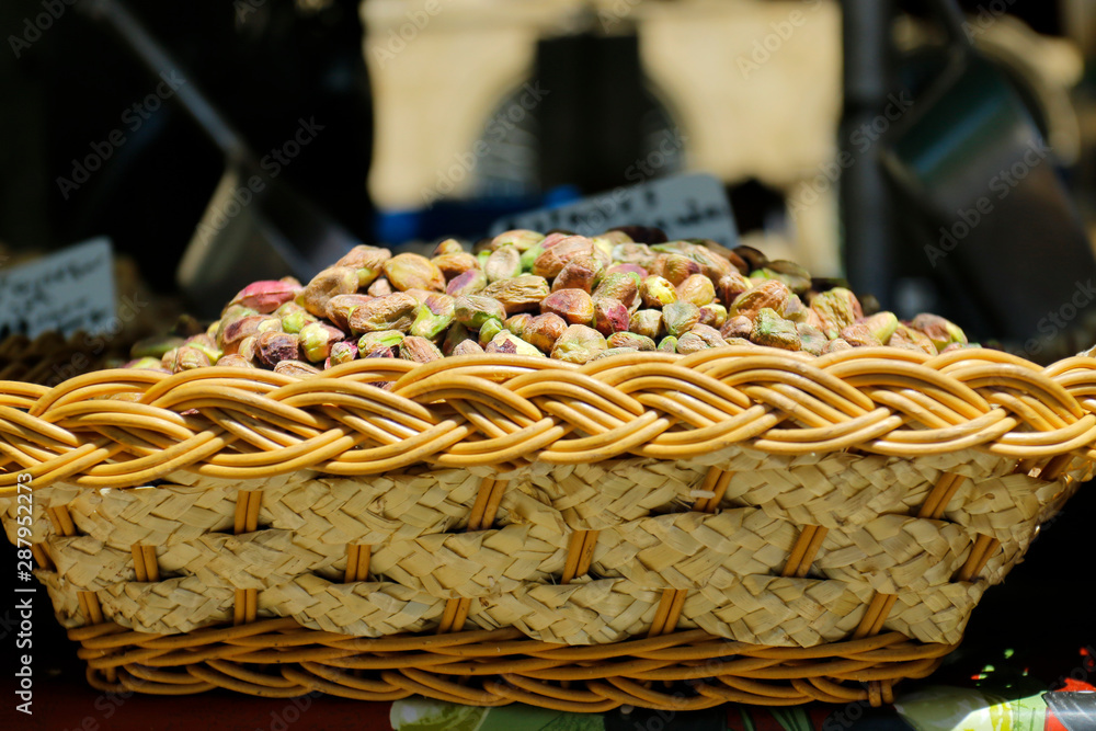 basket of dried pistachio sold in market basket of dried pistachio sold in market