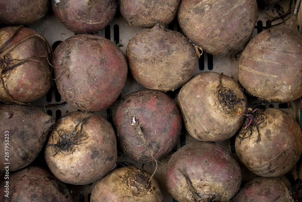 basket full of fresh red beets or beetroots, sweet, tasty, at local vegetable market, agriculture, food, diet, vitamins, nutrition, summer, background, Milan, Italy basket full of fresh red beets or beetroots, sweet, tasty, at local vegetable market, agriculture, food, diet, vitamins, nutrition, summer, background, Milan, Italy