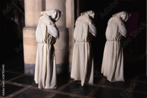 Monks in darkness