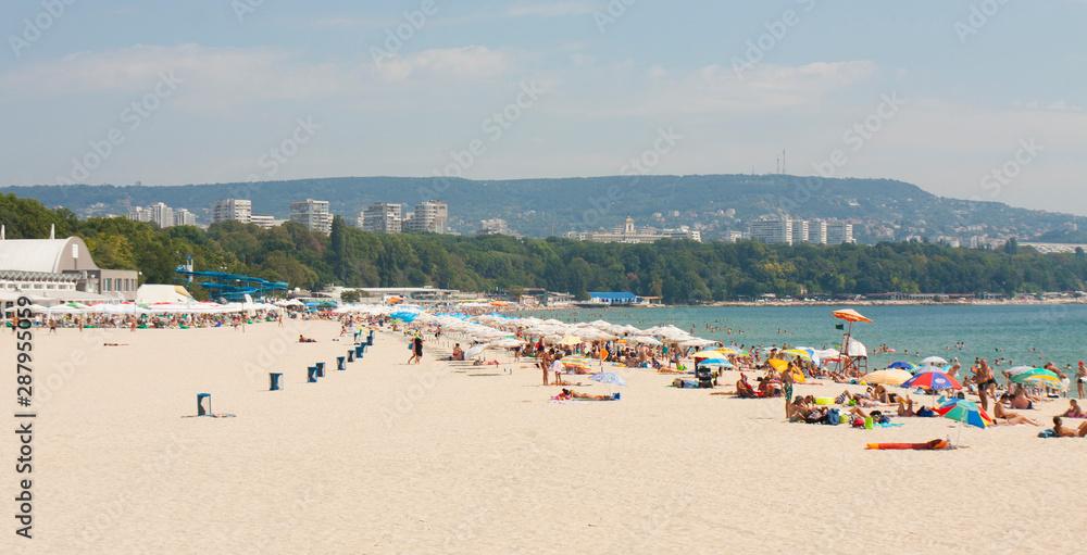 VARNA, BULGARIA - AUGUST 14, 2015: people rest on city beach.