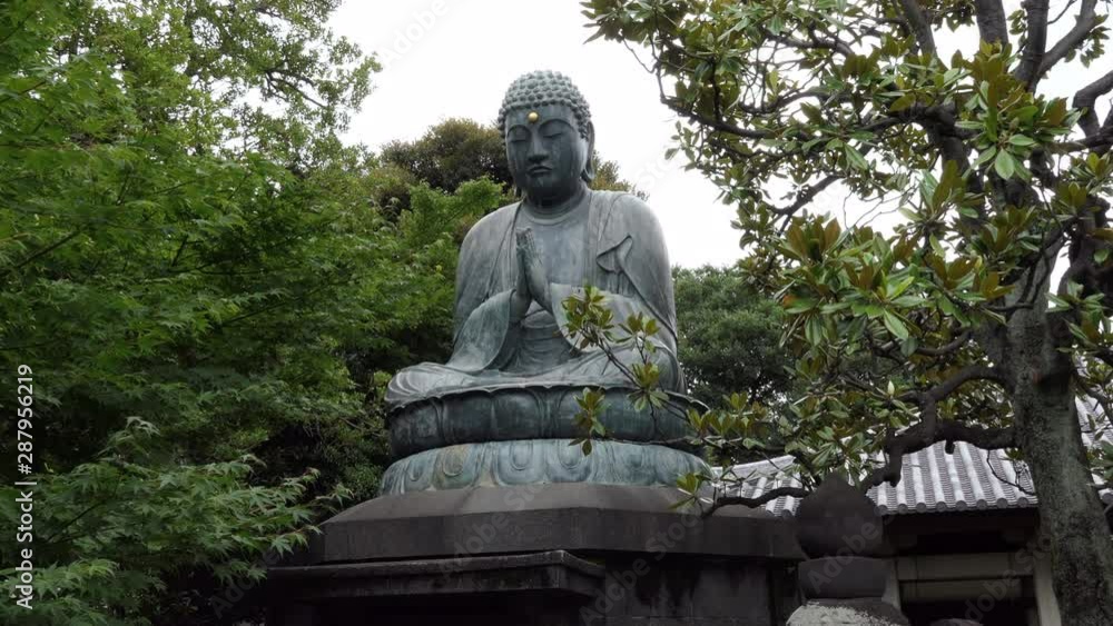 Tennoji or Tenno-ji temple, the oldest shrine in Yanaka area, Tokyo, Japan, Asia. Old Japanese religious building with art, Buddha statue, beautiful garden Tennoji or Tenno-ji temple, the oldest shrine in Yanaka area, Tokyo, Japan, Asia. Old Japanese religious building with art, Buddha statue, beautiful garden