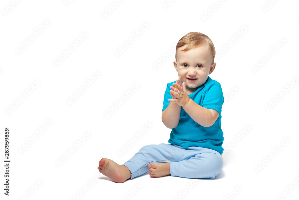 Cute baby boy playing isolated on the white background. Copy place Cute baby boy playing isolated on the white background. Copy place