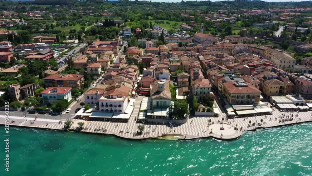 Aerial video with drone. Beautiful view of the city of Lazise, Italy. Garda lake. Aerial video with drone. Beautiful view of the city of Lazise, Italy. Garda lake.