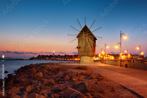 Old windmill in the ancient town of Nesebar in Bulgaria.The entrance to the old town. Bulgarian Black Sea coast. UNESCO world heritage site. © petiast