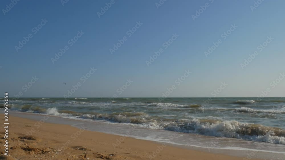 ocean or sea waves crashing on the shore. ocean or sea waves crashing on the shore.