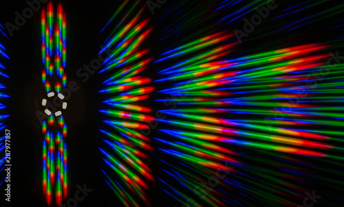 Photo of the diffraction pattern of LED array light, comprising a large number of diffraction orders obtained by the thin phase gratings photo