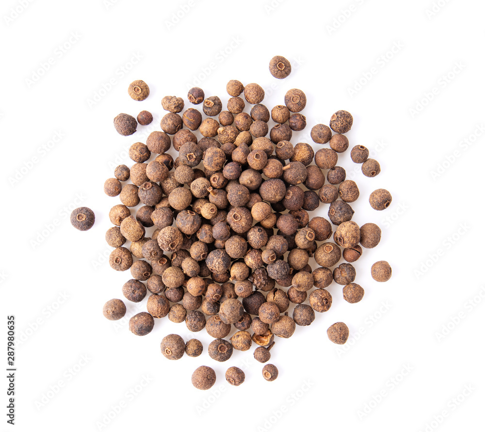 Allspice berries (also called Jamaican pepper or newspice) over white background. top view Allspice berries (also called Jamaican pepper or newspice) over white background. top view