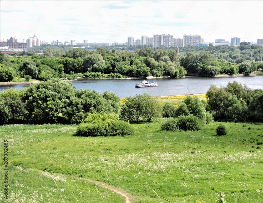 view of river and meadow in summer Moscow