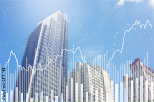 Stock market graph with volume indicator in modern business Skyscraper  concept for stock trading and financial markets