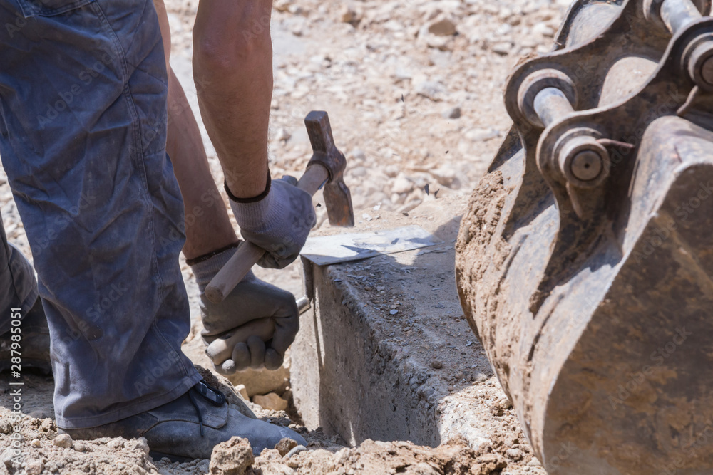 Heavy work for a construction worker on the site. Heavy work for a construction worker on the site.