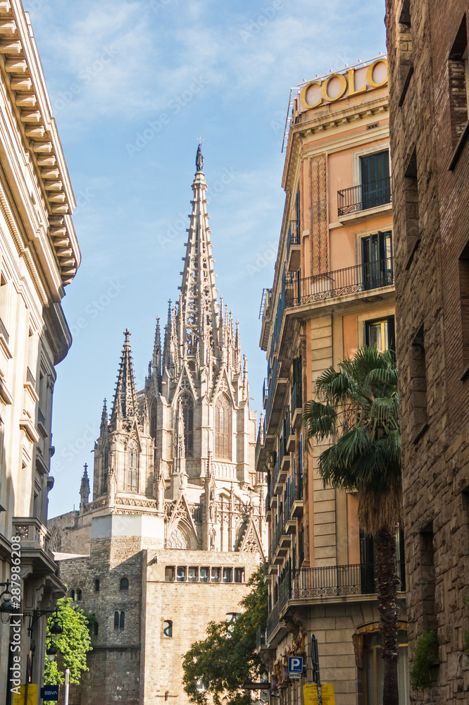 Medieval towers of the Metropolitan Cathedral Basilica of Barcelona (also known as The Cathedral of the Holy Cross and Saint Eulalia) located in the gothic quarter in Catalonia, Spain, Europe.
