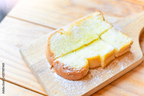Sugar Toast with Butter on Wooden Board