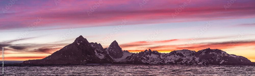 Panorama of Dramatic sunset over Antarctica peninsula
