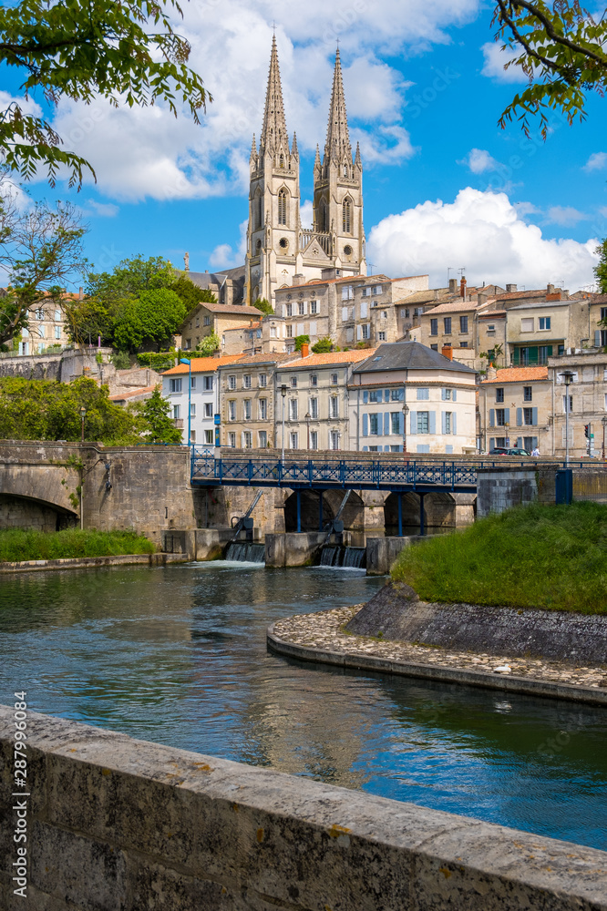 Naklejka premium A view of Niort from the quay of Sevre Niortaise river, Deux-Sevres, Poitou-Charentes region, France