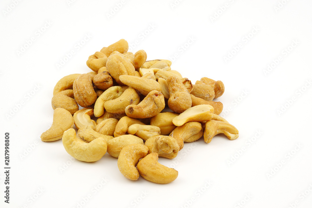 Roasted cashew nuts with salt isolate on white background
