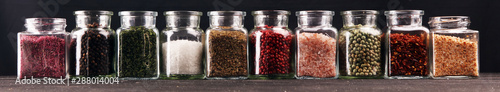 assortment of spices in glass on table. Food and cuisine ingredients and peppers