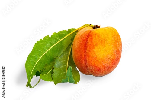 Peach with foliage on a white background.