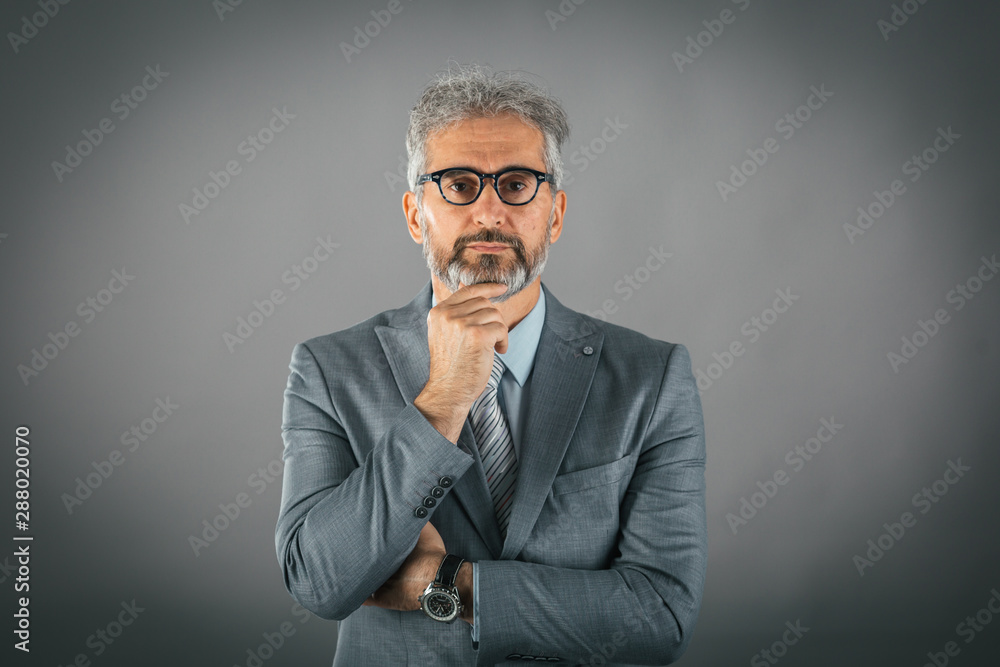 studio shot of confused businessman isolated studio shot of confused businessman isolated